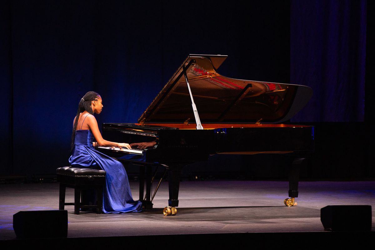 Jeneba Kanneh Mason on stage with piano