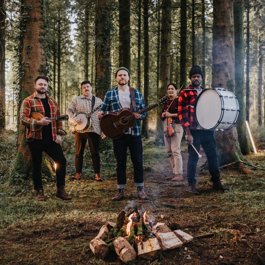 Northern Irish Christian folk rock worship band Rend Collective band members in a forest